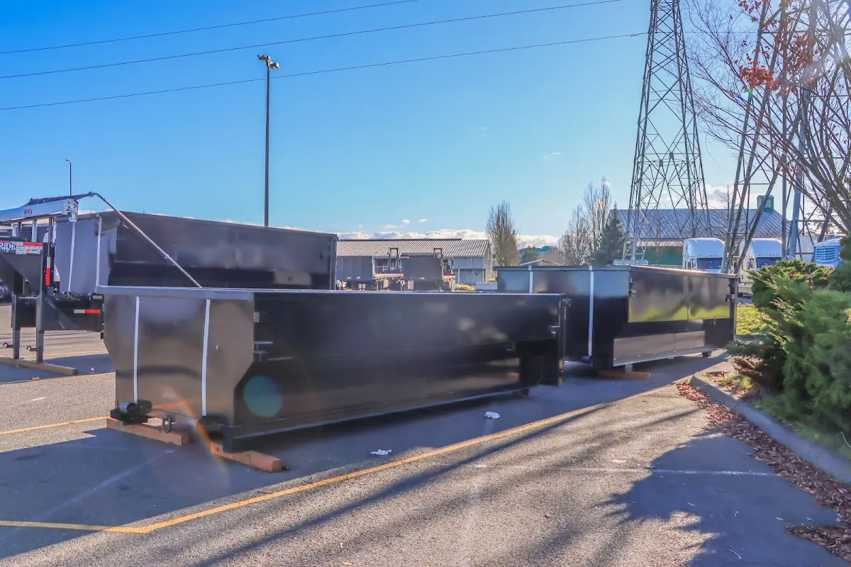 Roll-off dumpster ready for waste disposal at job site for Construction Dumpster Rental in South Londonderry